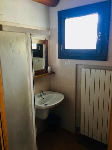 Koupelna v ubytování albergo panoramico