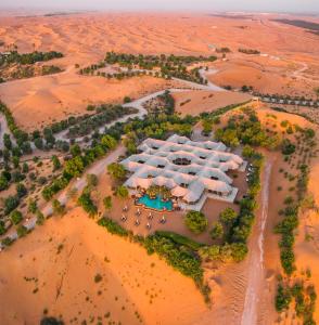 an aerial view of a resort in the desert at Telal Resort Al Ain in Al Ain