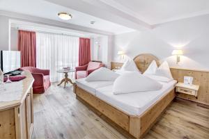 Ένα ή περισσότερα κρεβάτια σε δωμάτιο στο Boutique-Hotel Bauer