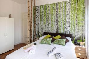 Postel nebo postele na pokoji v ubytování Apartmani Kaiserin