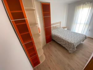 Un ou plusieurs lits dans un hébergement de l'établissement Apartamento Turístico en Aranjuez