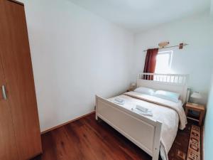 Katil atau katil-katil dalam bilik di Apartmani Stari Gaj
