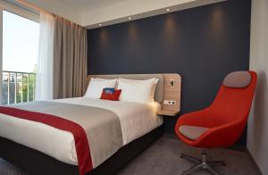 Krevet ili kreveti u jedinici u okviru objekta Holiday Inn Express Amsterdam - City Hall, an IHG Hotel