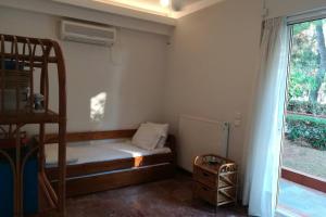 Postel nebo postele na pokoji v ubytování Pine tree beachfront villa