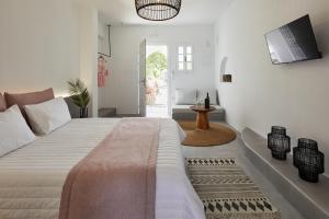 Ліжко або ліжка в номері Symmetry Suites