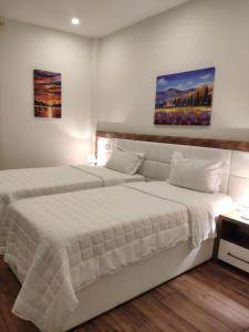 Letto o letti in una camera di Hotel TREVA