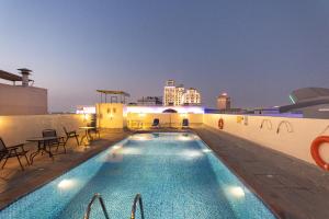 The swimming pool at or close to Auris Boutique Hotel Apartments - AlBarsha