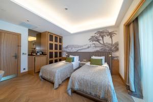 Кровать или кровати в номере Liberty Fabay - Ultra All Inclusive