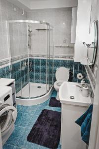 Ett badrum på Apartament Witkiewicza Sanok