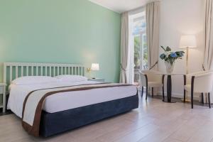 Ένα ή περισσότερα κρεβάτια σε δωμάτιο στο Hotel Lido Seegarten