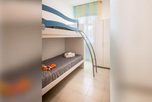 A bed or beds in a room at Villa DellAcqua