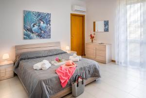 A bed or beds in a room at Villa DellAcqua