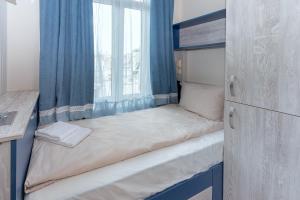 Posteľ alebo postele v izbe v ubytovaní BOLERO Suites