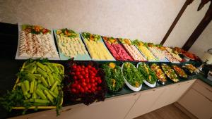 a buffet filled with different types of fruits and vegetables at Orient Express & Spa by Orka Hotels in Istanbul