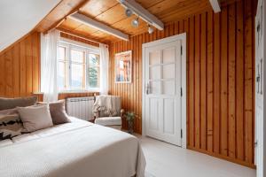 Posteľ alebo postele v izbe v ubytovaní Apartamenty Polana Pająkówka + 37 fotografií