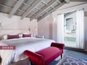 Postel nebo postele na pokoji v ubytování Rimondi Boutique Hotel - Small Luxury Hotels of the World