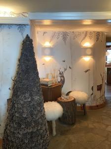 Posezení v ubytování Hôtel Le Grand Chalet Favre