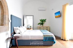 Ένα ή περισσότερα κρεβάτια σε δωμάτιο στο The Noble House - by Unlock Hotels