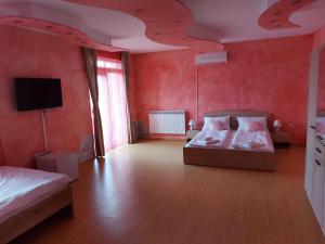 Postel nebo postele na pokoji v ubytování Casa Eric
