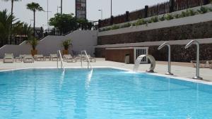 The swimming pool at or close to Swimsuit Friendly Holiday Home