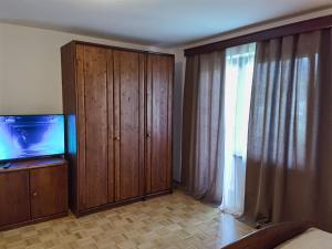 TV a/nebo společenská místnost v ubytování ATMOSPHERE Apartments