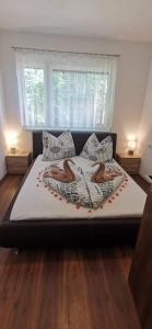 Posteľ alebo postele v izbe v ubytovaní Ohana Wellness apartman