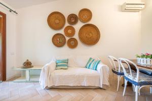 Ένα ή περισσότερα κρεβάτια σε δωμάτιο στο Casa Anna