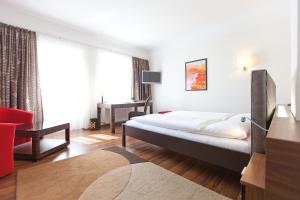 Postelja oz. postelje v sobi nastanitve Hotel Müller