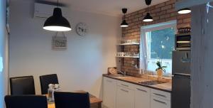 Kuchyňa alebo kuchynka v ubytovaní A Bringás Apartman