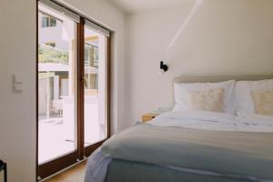 A bed or beds in a room at Bacherlhaus