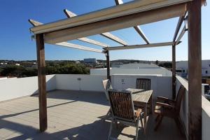 A balcony or terrace at Villa SA CALMA ESVENTADA - Relax y confort a sólo 5 minutos de la playa