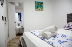 Postel nebo postele na pokoji v ubytování Hotel Nauticus