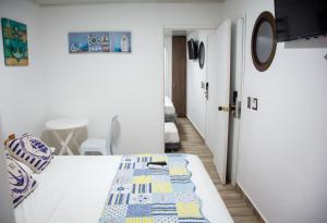 TV a/nebo společenská místnost v ubytování Hotel Nauticus
