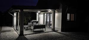 Patio alebo iná vonkajšia časť ubytovania Przystań pod Witoszą