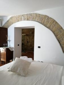 Postel nebo postele na pokoji v ubytování Casa Angelieri