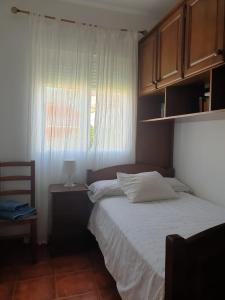 Postel nebo postele na pokoji v ubytování AT La Catamusa + 14 fotografií