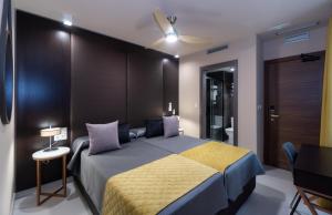 Кровать или кровати в номере Hotel Perla del Sur