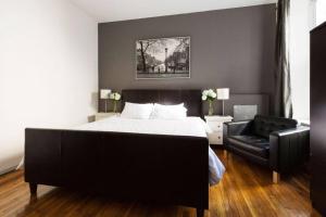 4 Bedroom NYC Apartment客房内的一张或多张床位