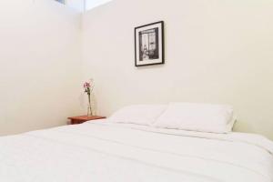4 Bedroom NYC Apartment客房内的一张或多张床位