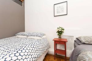 4 Bedroom NYC Apartment客房内的一张或多张床位