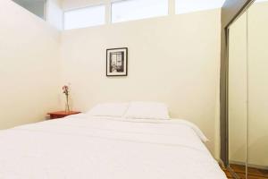 4 Bedroom NYC Apartment客房内的一张或多张床位