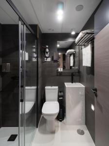 Ванная комната в Hotel Perla del Sur