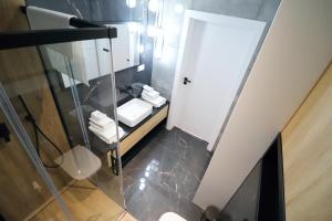Koupelna v ubytování Apartament NEBULA - MTN Gardenia Seaside Dziwnów + 27 fotografií