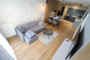 Kuchyň nebo kuchyňský kout v ubytování Apartament NEBULA - MTN Gardenia Seaside Dziwnów