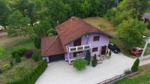 an overhead view of a purple house with a driveway at EMRAH RIVER UNA in Bihać