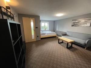 Postel nebo postele na pokoji v ubytování Apartments Maxi