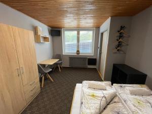 Postel nebo postele na pokoji v ubytování Apartments Maxi