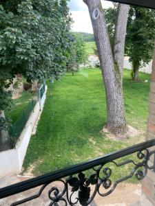 a view of a park from a balcony at Le Clos Adnet in Villers-Marmery