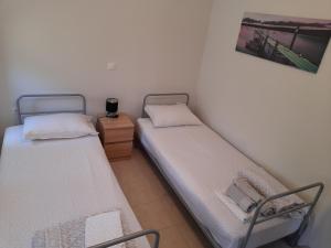 Postel nebo postele na pokoji v ubytování Kalypso relaxing shelter