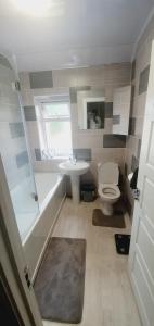 Een badkamer bij Petals Room